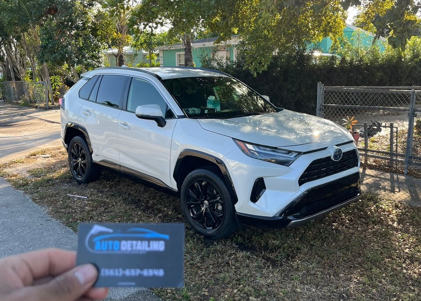 Toyota RAV4 with J's Auto Detailing business card