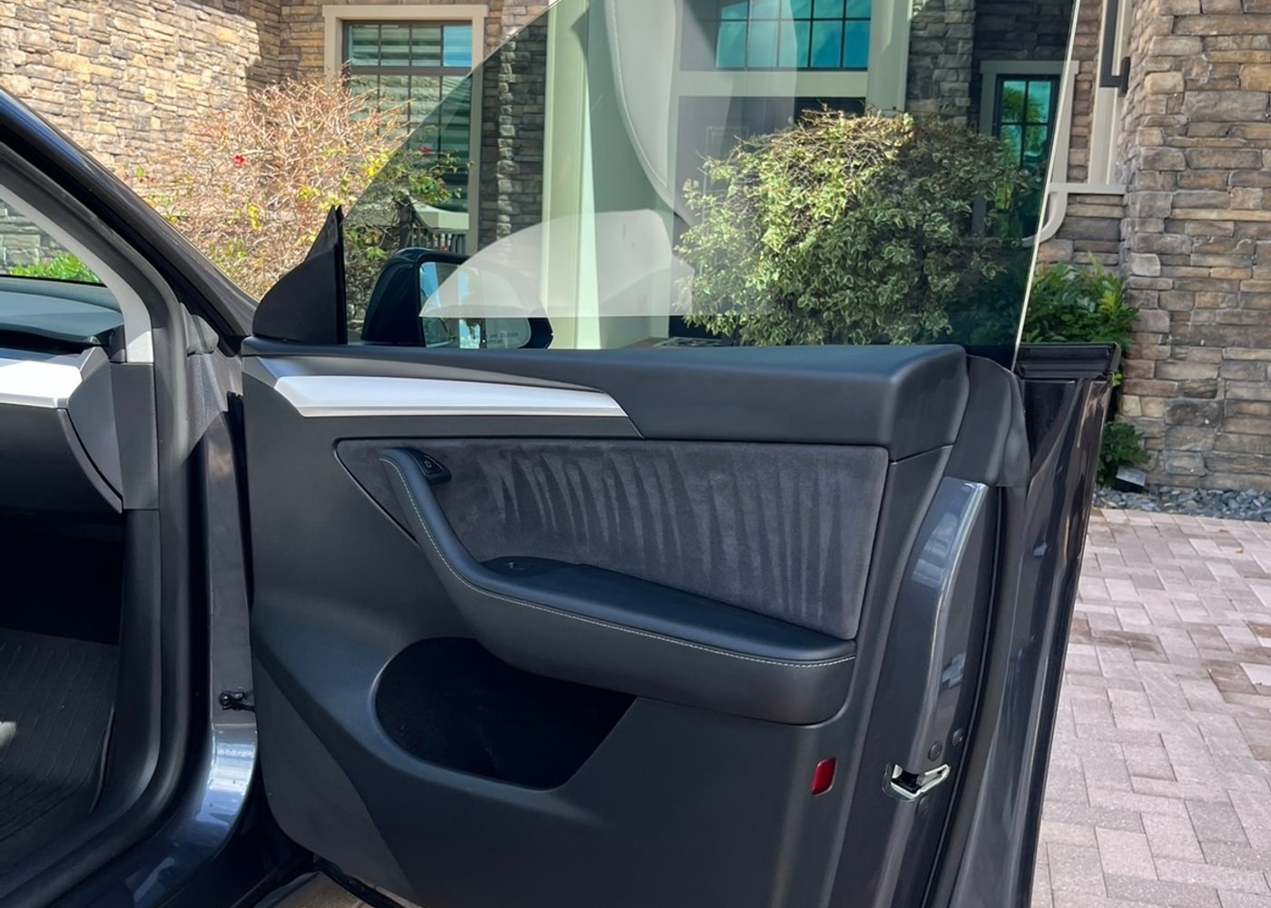 Tesla door panel interior by J's Car Detailing